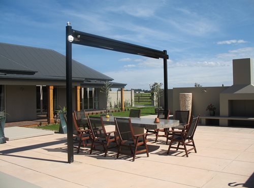 Outdoor canopy closed over dining table